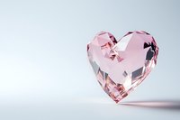 Pink crystal heart shape on light background with soft shadow, luxury romantic symbol for valentines day and wedding design elements.