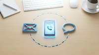 Modern business communication concept with smartphone displaying incoming call surrounded by email and chat bubble icons on wooden desk with office supplies.