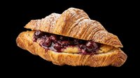 Flaky croissant filled with dark berry jam and dusted with powdered sugar, isolated on transparent background. Great for bakery clipart, t-shirt design, stickers, print on demand.