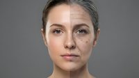 Middle-aged Caucasian woman showing aging process with half face wrinkled and half smooth skin for skincare and anti-aging treatment concepts.