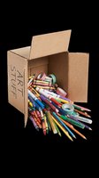 Open cardboard box overflowing with colorful markers, colored pencils, crayons, and art supplies isolated on transparent background. Ready for design use.