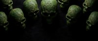 Ornate green skulls with intricate Celtic patterns arranged on dark background, suitable for gothic, Halloween, fantasy, and mystical design projects.