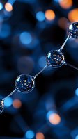 Molecular structure with glowing bokeh lights reflecting in transparent spheres against dark blue background, creating scientific atmosphere.