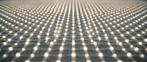 Rows of glowing LED lights arranged in a precise grid pattern on a textured surface, creating a futuristic luminous display with depth and perspective.
