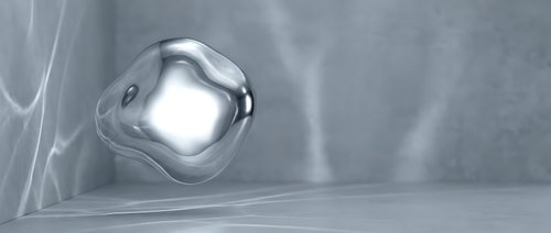 Reflective metallic sphere with liquid mercury-like surface on textured gray background, suitable for tech, science, and abstract design projects.
