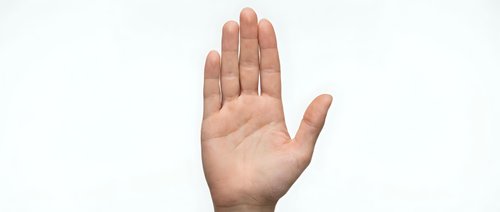 Open palm hand gesture showing stop sign isolated on white background for communication and body language concepts.