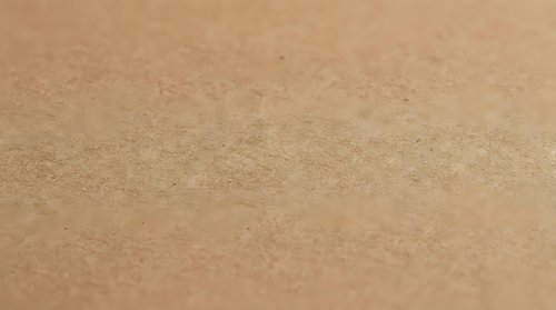 Fine sand texture background with smooth golden beige surface. Natural desert or beach material with subtle grain pattern for design projects.