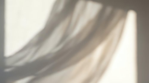 Abstract flowing curves in soft beige and gray tones creating elegant waves with gentle shadows and highlights for modern minimalist design backgrounds.