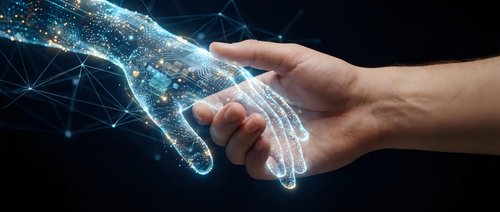 Human hand reaching toward digital robotic hand with glowing network connections representing artificial intelligence and human-technology collaboration.