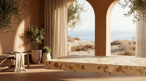 Mediterranean terracotta terrace with arched columns overlooking coastal landscape, warm sunlight creating peaceful atmosphere for luxury interior design.