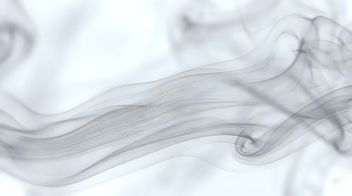 Abstract gray smoke waves flowing gracefully on white background creating elegant ethereal patterns for modern design projects and artistic compositions.