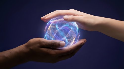Hands protecting glowing digital globe with network connections representing global technology, cybersecurity, data protection and worldwide communication.