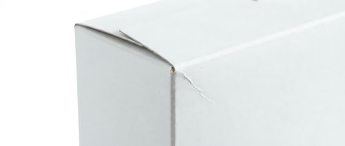 White cardboard packaging box corner detail on clean background for product mockup and branding design projects.