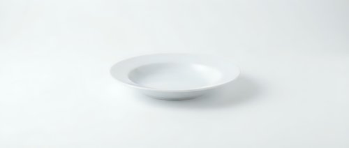 Empty white ceramic plate on clean white background isolated for kitchen dining restaurant menu design presentations.