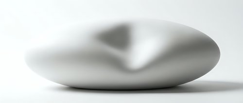 Smooth gray zen stone with natural indentation creating calming meditation focal point for wellness and mindfulness practices on clean white background.