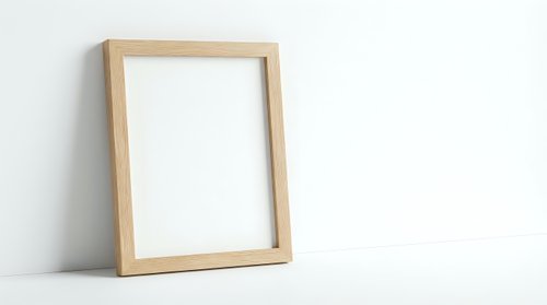 Empty wooden picture frame leaning against white wall, mockup template for artwork display, home decor and interior design projects.