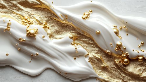 Luxurious white cream with golden shimmer and metallic spheres creating elegant flowing texture for premium cosmetic and beauty product designs.