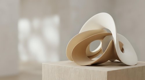 Modern abstract sculpture with curved cream ribbons on wooden pedestal showcasing contemporary art and minimalist design for interior decoration.