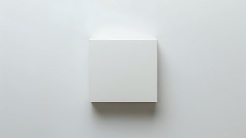 White blank square canvas mounted on light gray wall with soft shadow, minimalist art display mockup for gallery exhibition or home decor presentation.