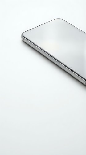 Modern silver laptop computer closed on clean white background with minimalist design and sleek metallic finish for technology and business concepts.