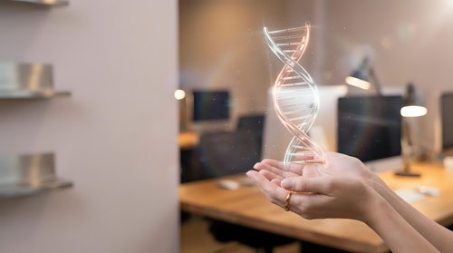 Hand holding glowing DNA helix model in modern laboratory setting, representing genetic research, biotechnology innovation, and scientific discovery in medical or pharmaceutical development.