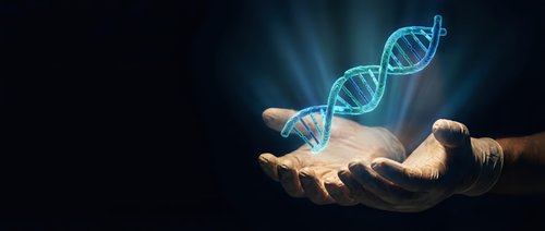 Hands holding glowing DNA double helix structure with blue light effects on dark background for genetic research and biotechnology concepts.