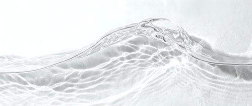 Abstract flowing water wave with transparent liquid motion and dynamic splash creating elegant curves on white background for modern design projects.