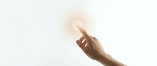 Hand reaching toward glowing light orb with magical energy effect on white background for spiritual and inspiration concepts.