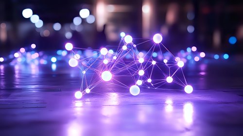 Digital network connections with glowing nodes and lines on reflective surface against blurred city lights background for technology concepts.