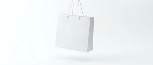 White paper shopping bag with handles floating on clean minimalist background for retail branding and commercial design projects.