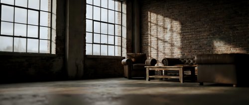 Empty industrial loft interior with large windows casting dramatic shadows on brick walls and concrete floor, vintage furniture creating moody atmosphere.