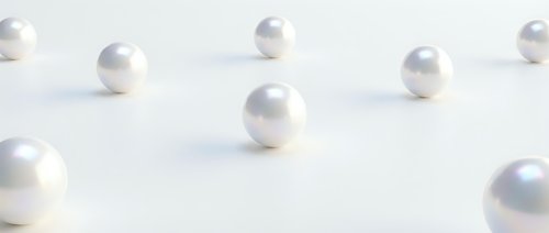 Elegant white pearls scattered on soft neutral background creating luxurious jewelry concept for fashion and beauty designs.