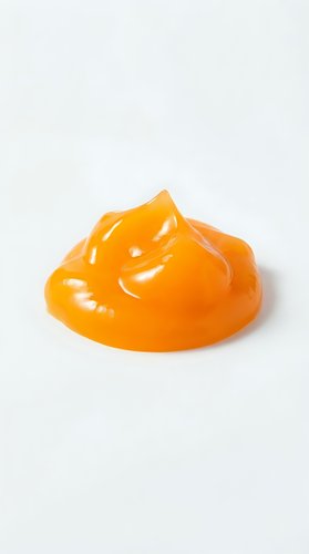 Bright orange gel or slime isolated on white background, glossy texture with dimensional peaks, suitable for cosmetics, skincare, or design projects.
