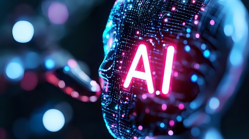 Glowing AI text on digital wireframe face silhouette with pink and blue bokeh lights creating futuristic technological atmosphere. Modern artificial intelligence concept.