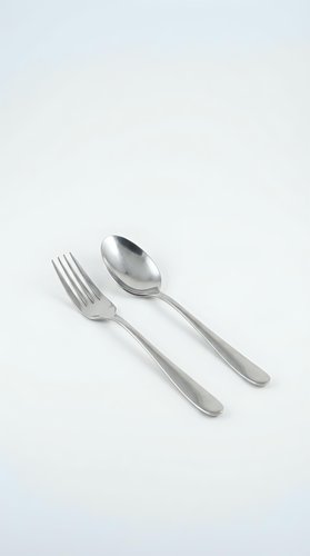 Stainless steel fork and spoon set isolated on white background for kitchen dining and restaurant use.
