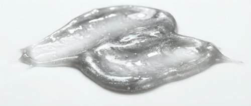 Transparent gel or slime isolated on white background, ready for design use on merchandise, packaging, and digital projects.
