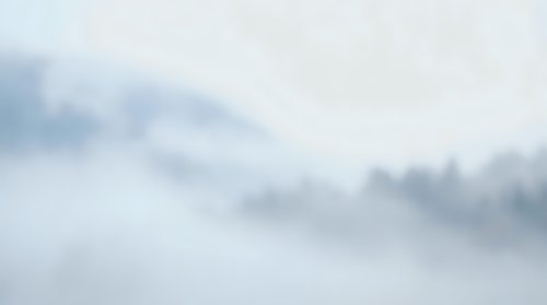 Soft gray and white clouds floating in overcast sky creating moody atmospheric background for weather forecasts and nature projects.