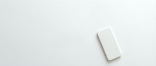 White smartphone mockup on clean minimalist background for app presentation and digital marketing materials.