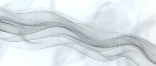 Abstract flowing gray smoke waves on white background creating elegant curved lines and soft gradients for modern design projects.