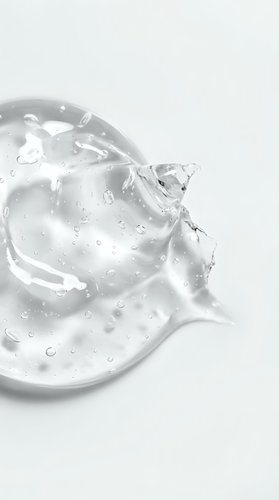 Clear gel or serum droplet with water bubbles on white background, isolated cosmetic product for skincare, beauty, and dermatology design use.
