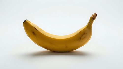 Ripe yellow banana isolated on white background, ready for design use on packaging, menus, nutrition guides, and educational materials.