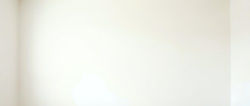 I can see this is a very light, minimalist image with a soft beige and white gradient background. However, the image appears to be extremely minimal with very little distinct content or subject matter to describe for stock photography purposes.