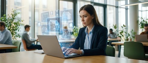 Professional businesswoman working on laptop in modern office space with city view and natural lighting for corporate presentations.