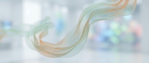 Flowing translucent ribbon in soft pastel colors floating gracefully against blurred bokeh background for elegant design projects and presentations.