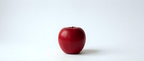 Fresh red apple isolated on white background for healthy eating and nutrition concepts.