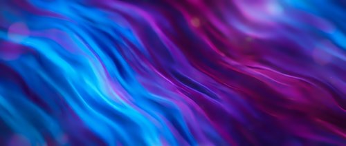 Abstract flowing waves in vibrant blue and purple colors creating dynamic motion background for modern digital design and creative projects.
