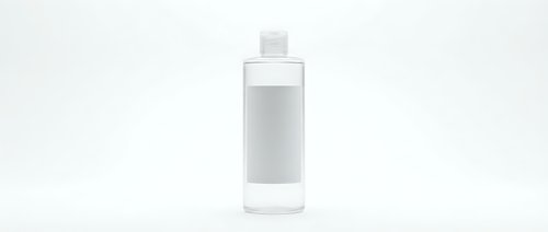Clear glass bottle with white pump dispenser isolated on white background for cosmetic and skincare product mockup designs.