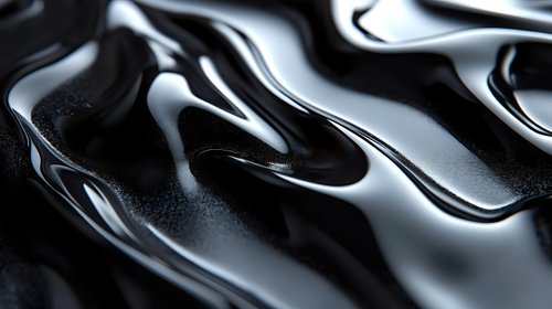 Monochromatic abstract liquid metal surface with flowing waves and curves creating dramatic light and shadow play on black background. Suitable for luxury design projects.