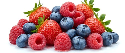 Fresh mixed berries pile with strawberries, blueberries and raspberries isolated on white background for healthy eating and cooking recipes.