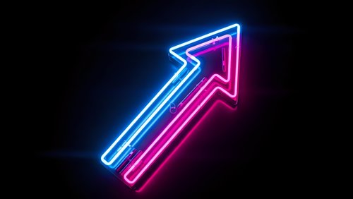 Neon arrow pointing upward with blue and pink glowing lights on dark background for business growth and success concepts.